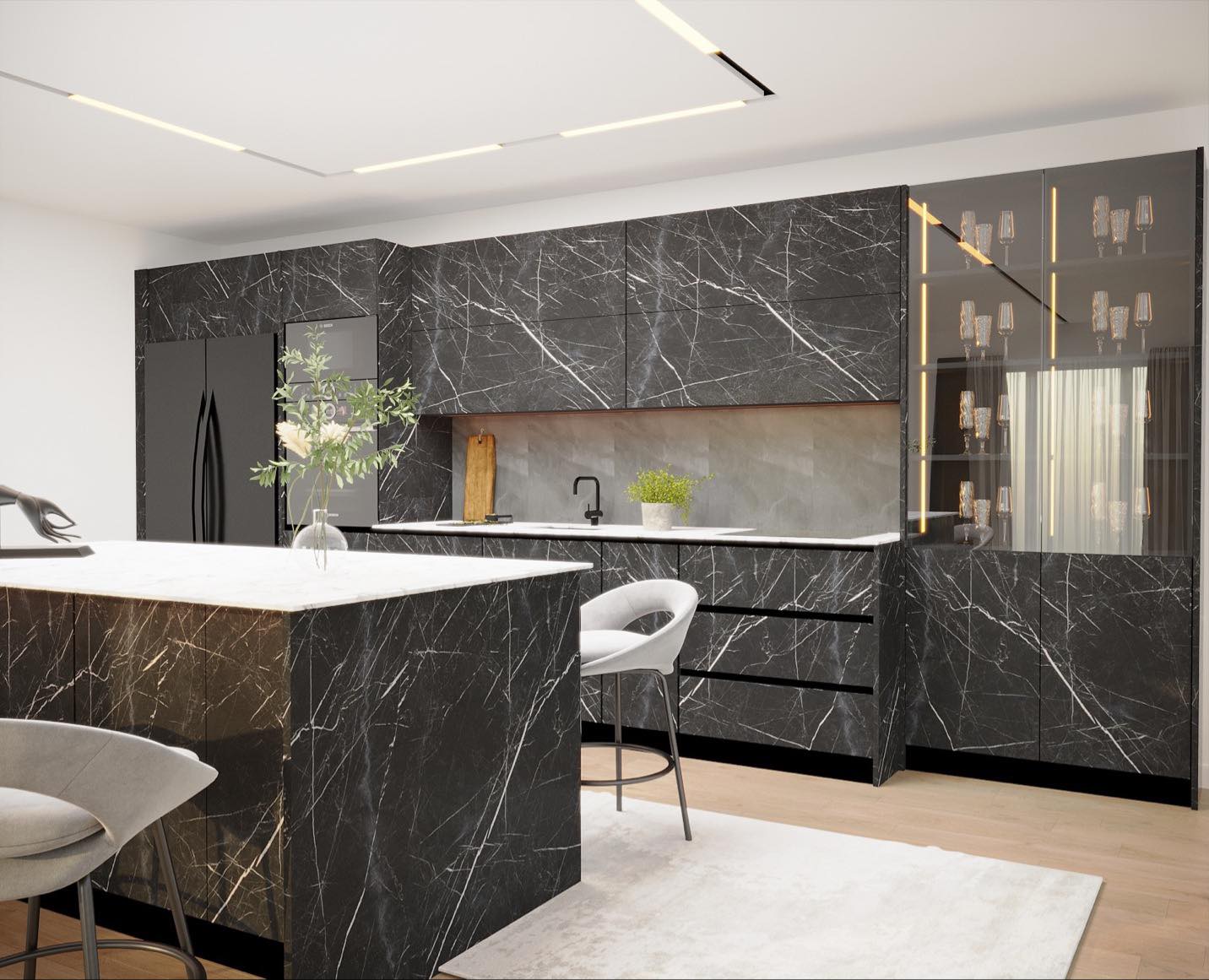 Cuisine graphite avec long plan de travail et éclairage linéaire